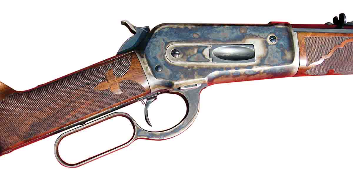This Model 1886 Winchester was restored by Al Springer, including the color case hardening.